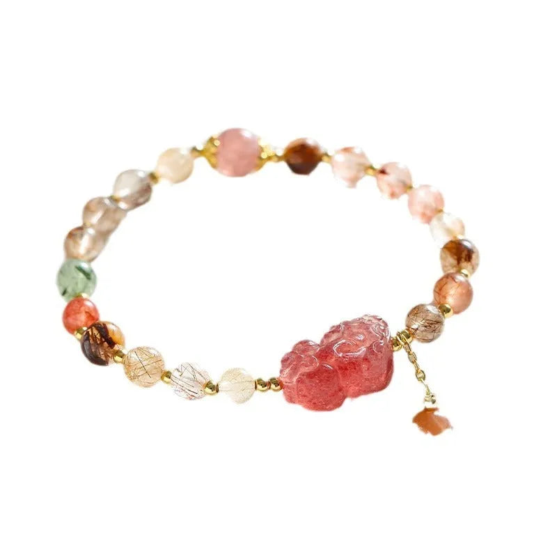Women's strawberry quartz and copper bracelet with Pixiu charm, pearl, and dopamine crystals.