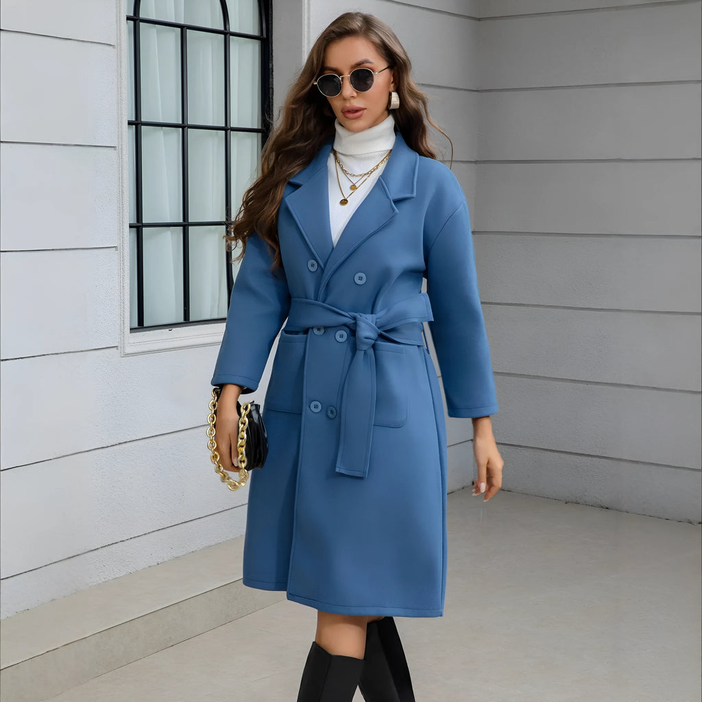 Blue waist-tie mid-length women's wool coat with patchwork pockets