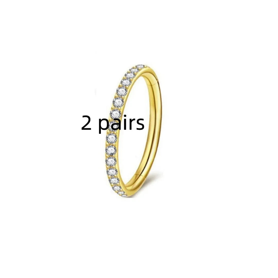 Two pairs of stainless steel seamless nose rings with a diamond design, showing gold and rose gold colour options.