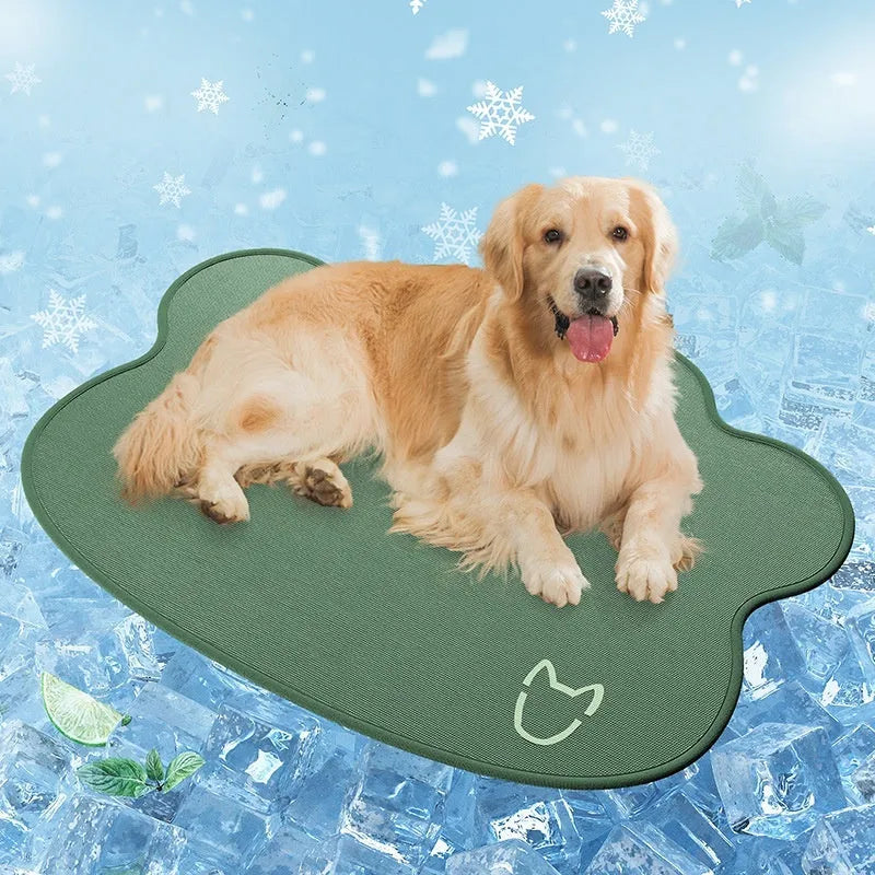 Light grey dog head shaped ice silk cooling mat for pets on a wooden floor.