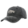 Adult personalised peaked cap with embroidered vintage letters, shown in beige colour.