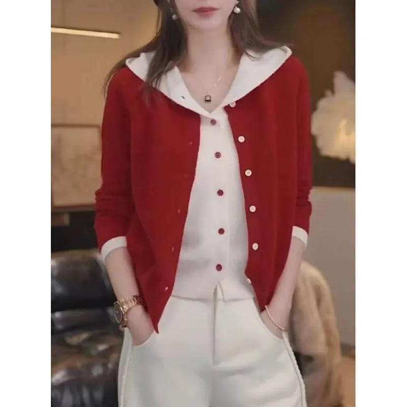 Women's long sleeve knit cardigan in pink with false two-piece design and colour contrast