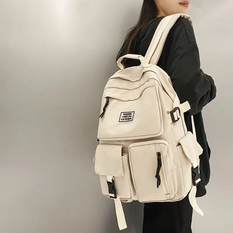 Black and white soft nylon student backpack with laptop compartment and three-dimensional pockets