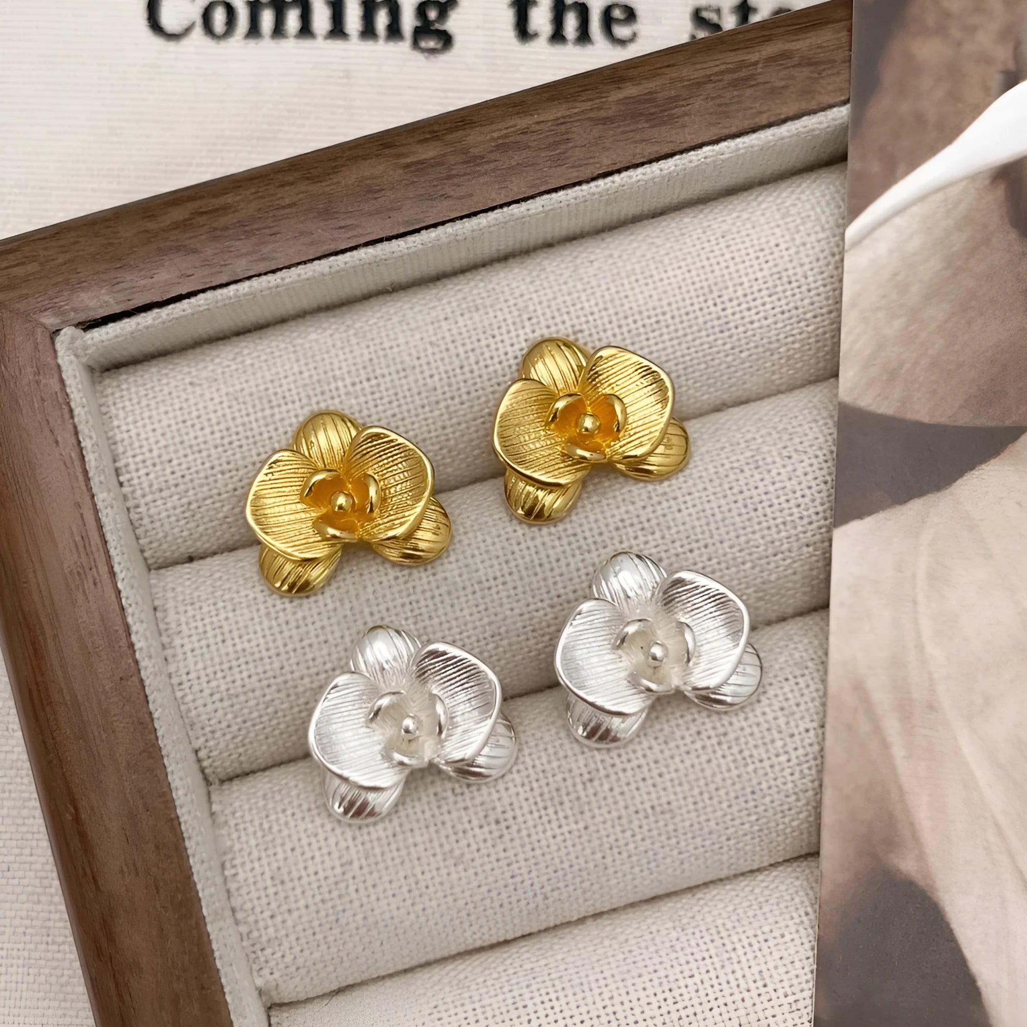 Women's retro floral earrings with gold or silver electroplated finish and petal design