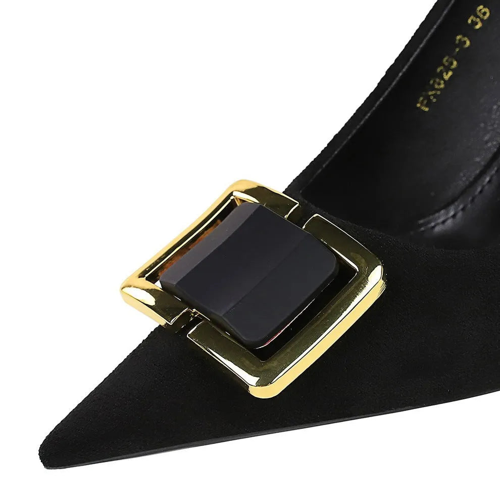 Black suede women's high-heel shoes with a 9cm stiletto heel and pointed toe on a plain background.
