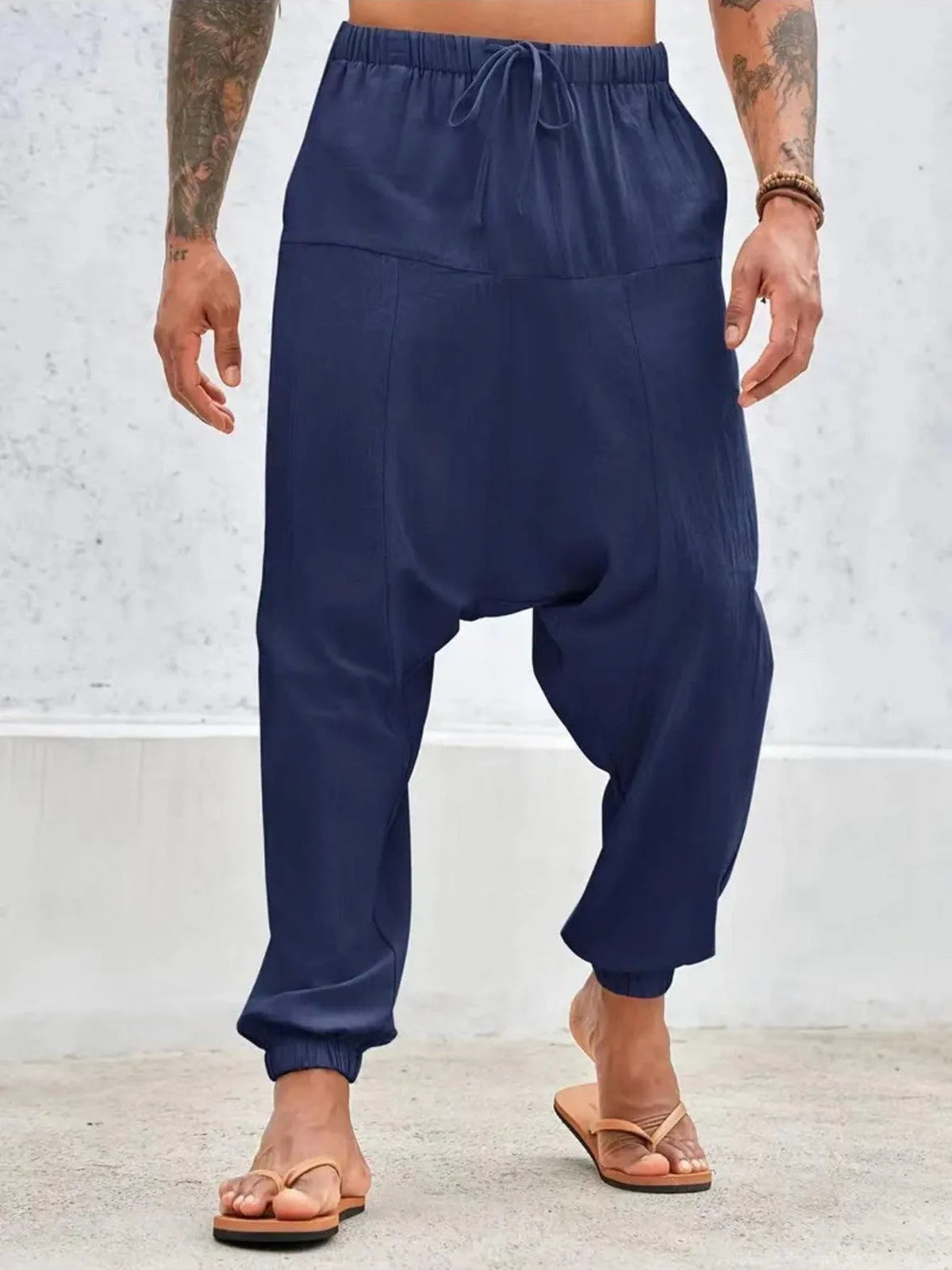 Summer breathable cotton cuffed pants with drawstring waist in khaki colour on model