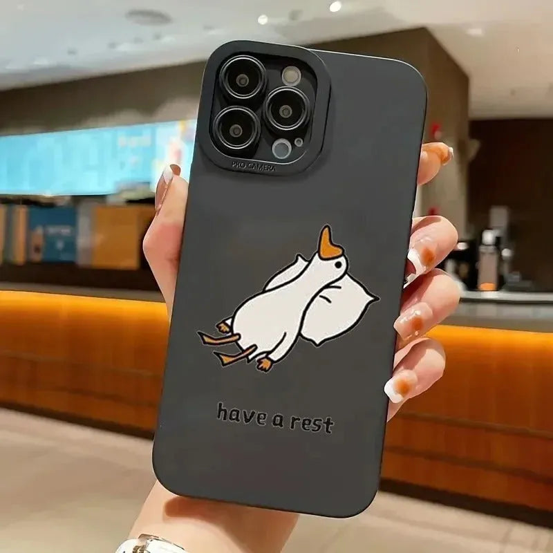 Black silicone iPhone case with a carved cartoon duck design on the back