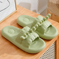 Women's EVA flip flop slippers with deer horn design and non-slip sole in light yellow.