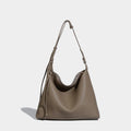 Caramel coloured soft PU messenger bag with underarm shoulder strap