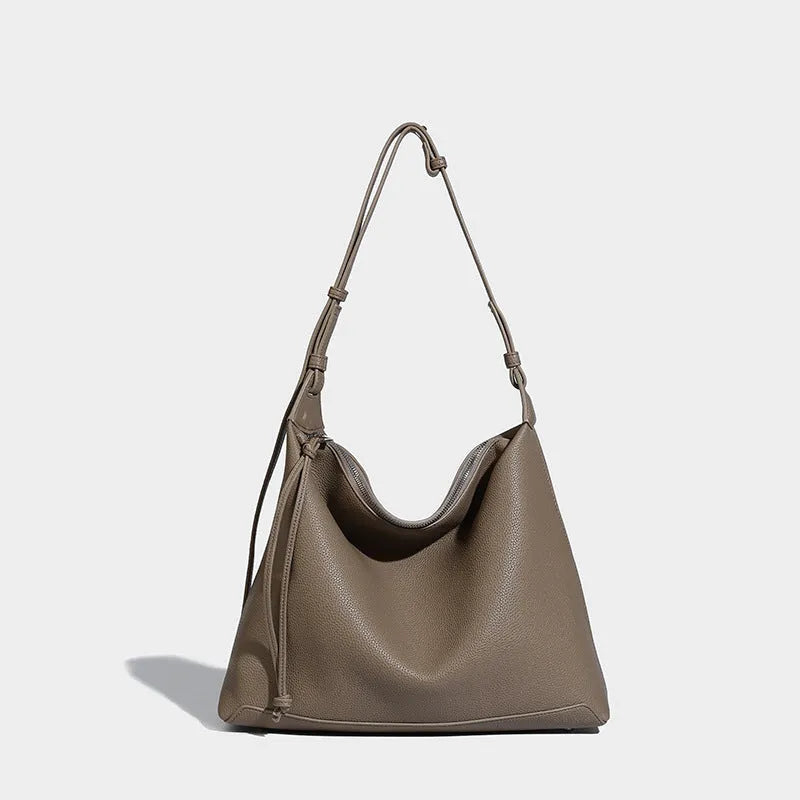 Caramel coloured soft PU messenger bag with underarm shoulder strap