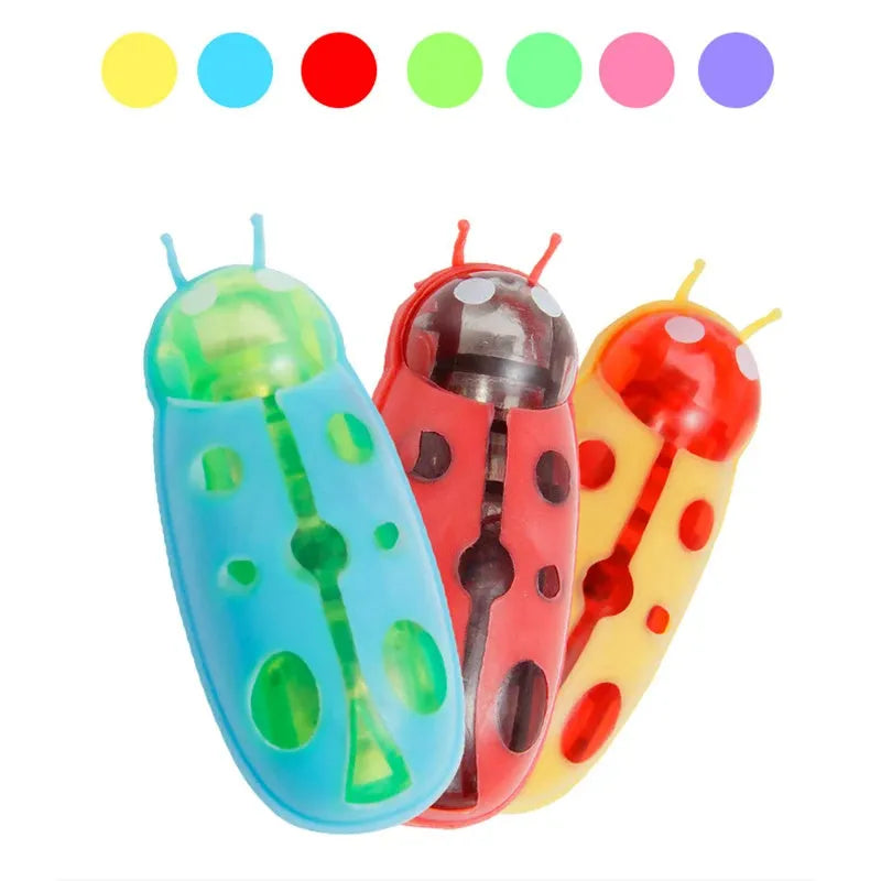 Electric ladybird bug cat toy with motorised walking motion and automatic flip feature