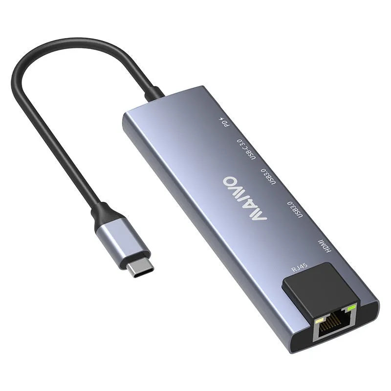 Steam Deck six-in-one USB-C docking station with aluminium shell, showing HDMI, USB 3.0, and RJ45 Ethernet ports.