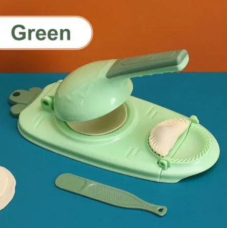 Orange and white plastic dumpling maker tool with ergonomic handle and hanging hole