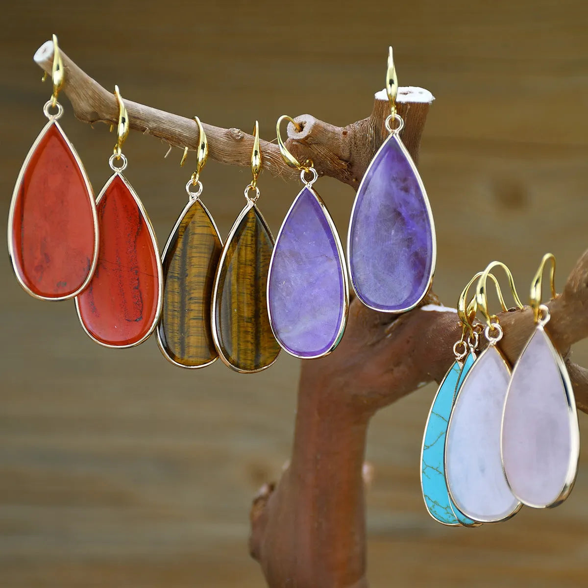 Vintage long drop earrings made from Tigereye stone with water droplets design