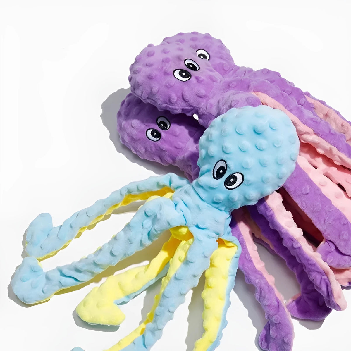 Plush long-legged octopus pet toy with ringing paper and creaking elements in blue or purple crocheted design