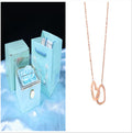 Rotating rose jewellery gift box with acrylic transparent cover showing preserved rose and rotating drawer open.