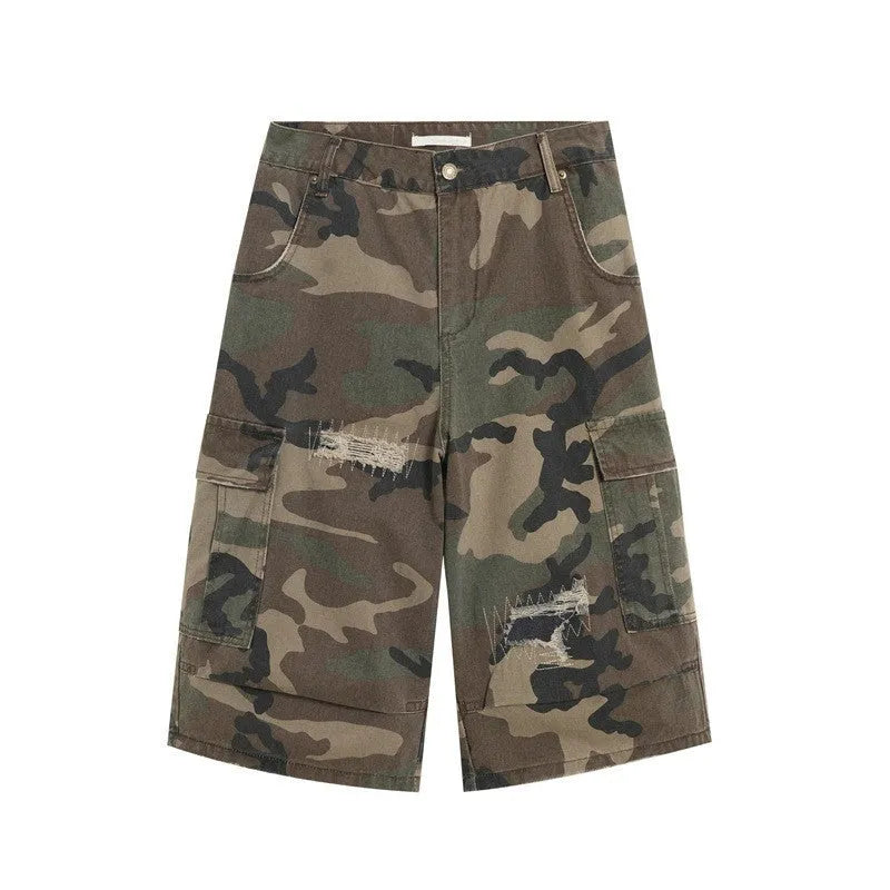 Men's loose-fit camouflage coloured cropped jeans with ripped details and straight-leg cut.