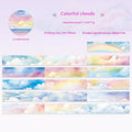 Roll of Japanese paper sky theme washi tape showing colourful clouds design, 30mm wide.