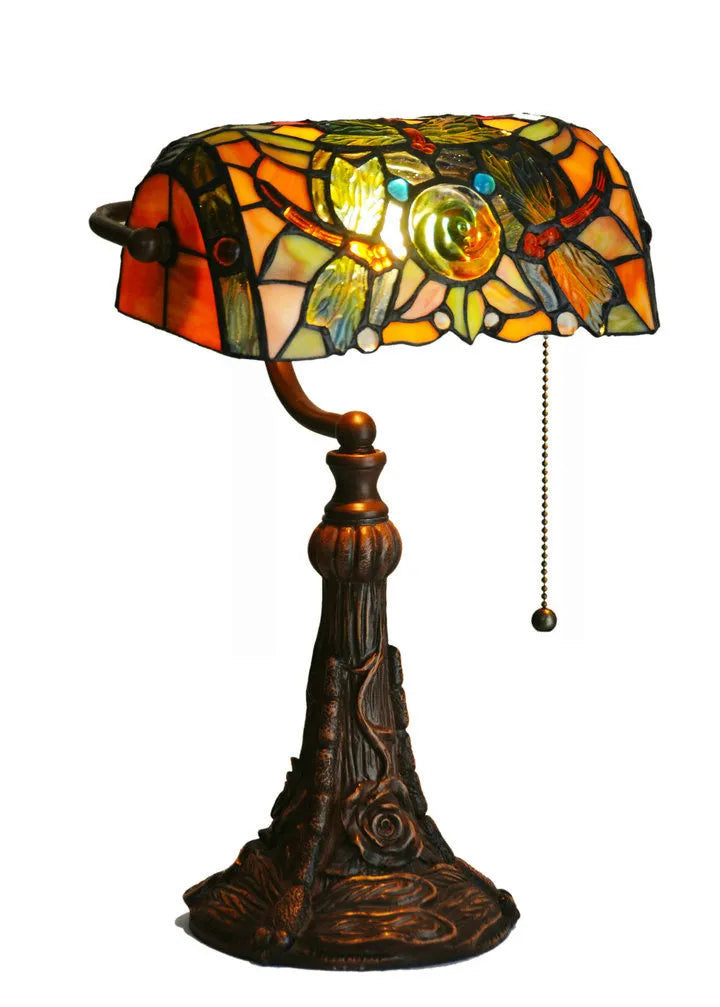 10-inch Tiffany style desk lamp with coloured stained glass shade and matching resin base on a wooden table.