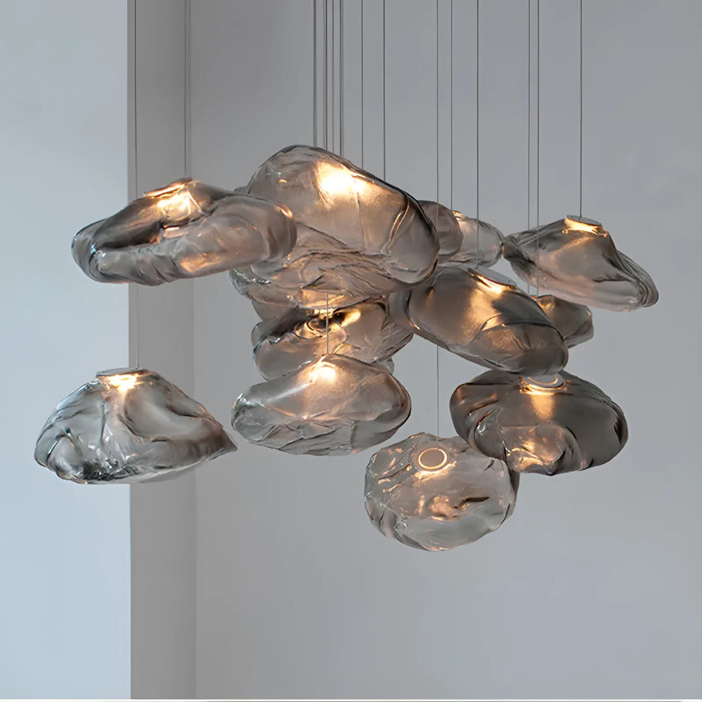 Modern fabric chandelier with glass shade in clear, amber, or smoke grey colour options.