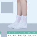White reusable PVC high-top waterproof shoe cover for women with anti-skid sole.