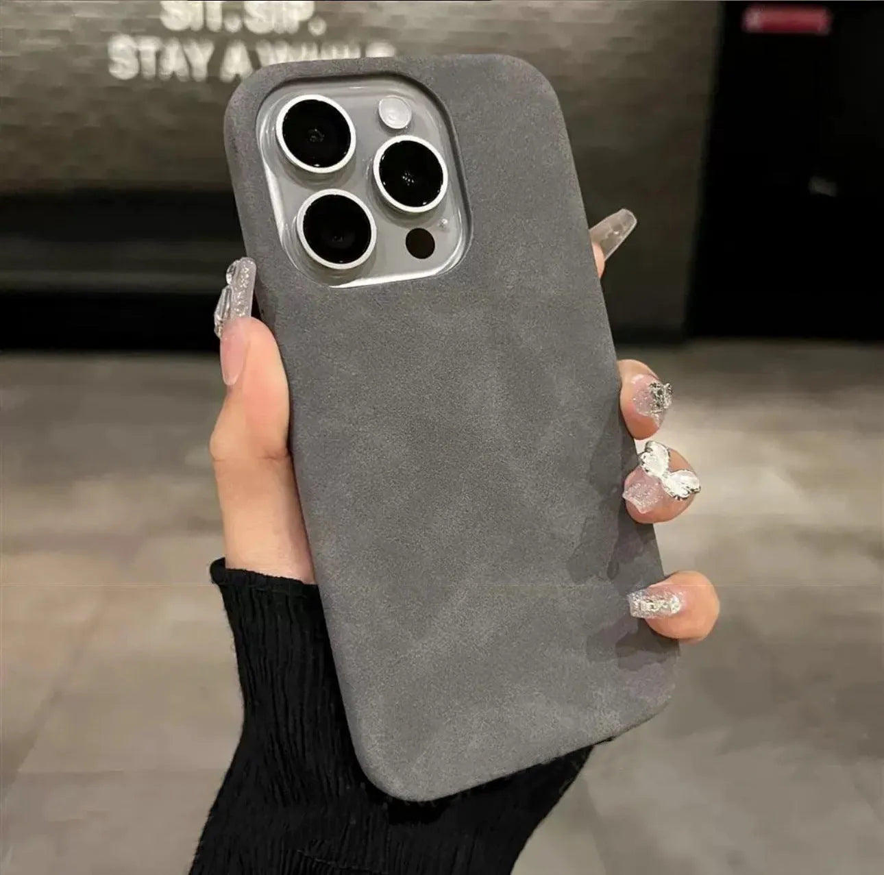 Solid colour frosted suede imitation leather shockproof iPhone case in dark green, shown as a half-pack style.