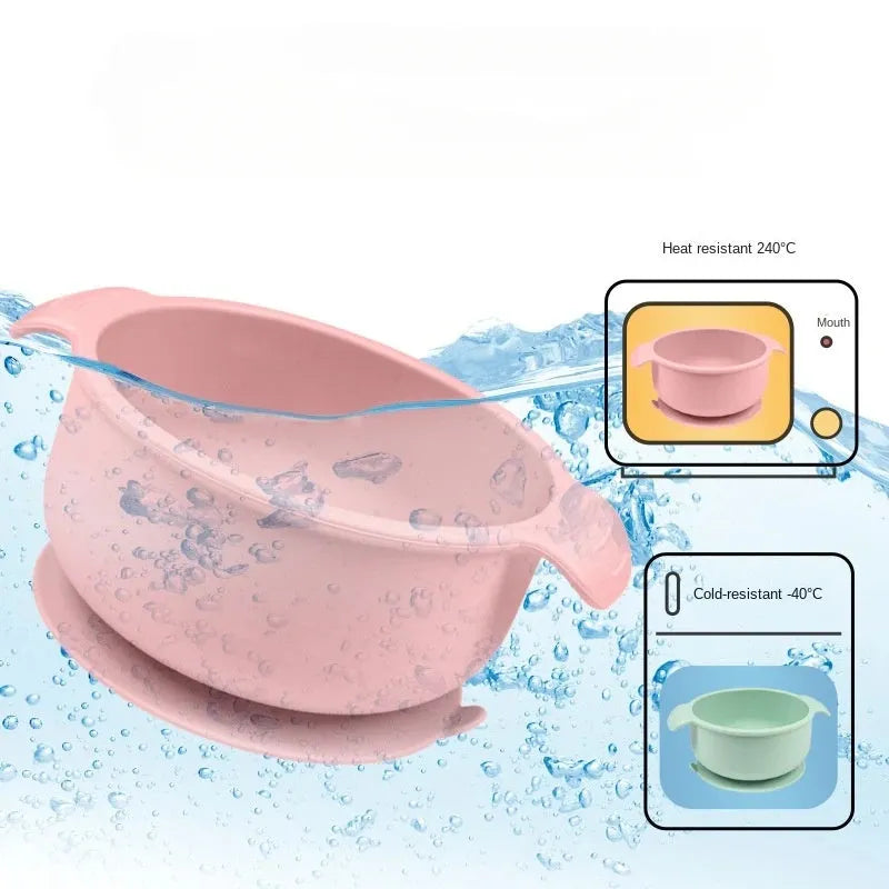 Blue silicone pet bowl with a white suction cup base on a kitchen floor.