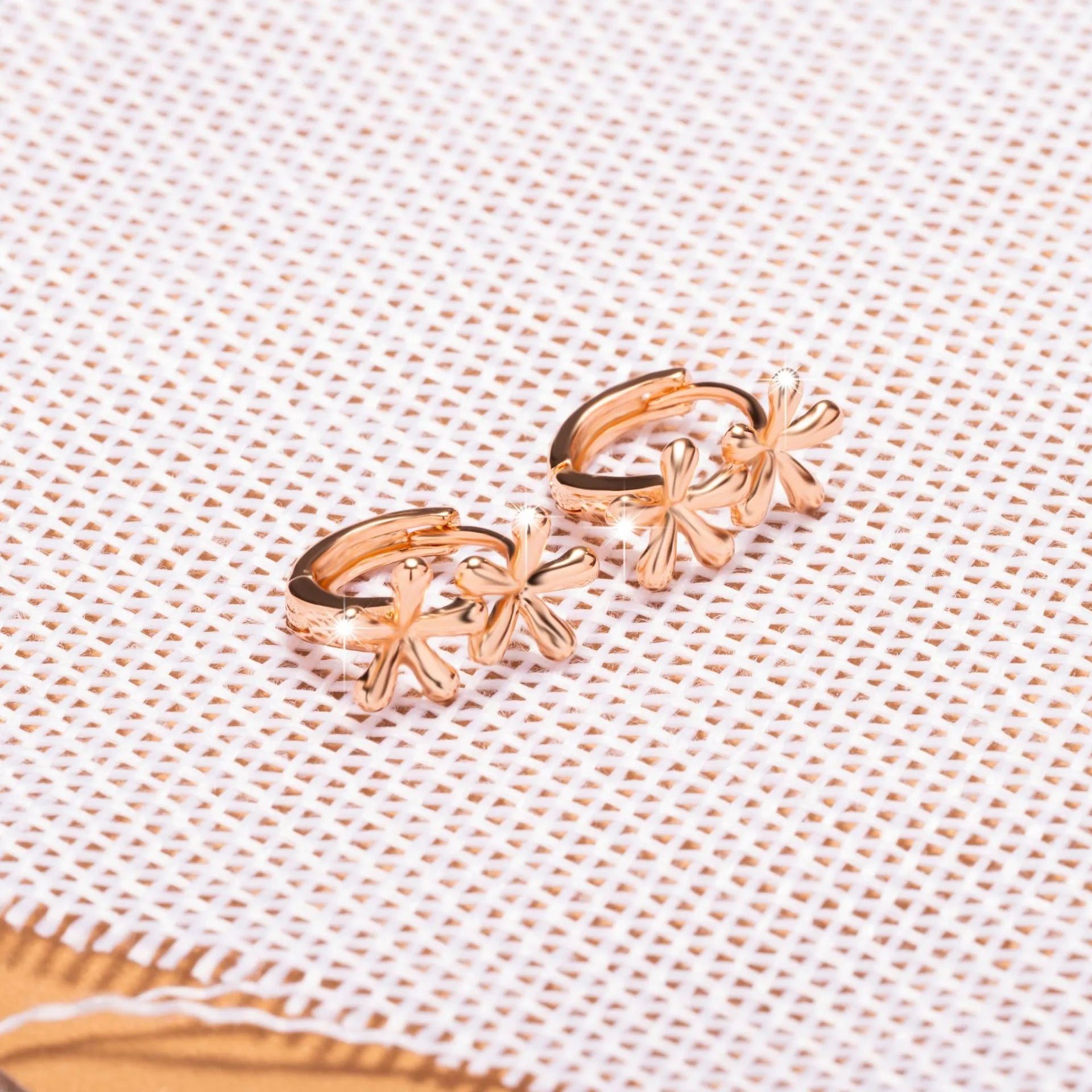 Rose gold circular earrings with a European waterdrop flower design for women.