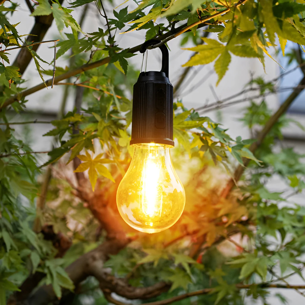 Five solar powered lantern style outdoor light bulbs with warm white LED lighting