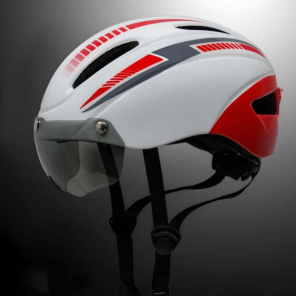 Adult bicycle helmet with integrated red LED taillight on the rear, shown in a black, blue, and white colour combination.