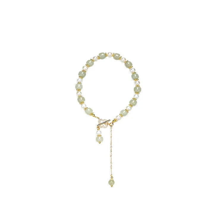 Hetian jade bracelet with gold electroplated alloy clasp and round pearl pendant