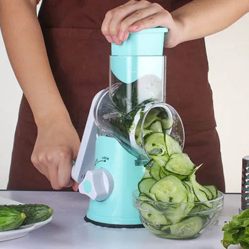 Blue manual round mandoline vegetable and cheese slicer with stainless steel blades.