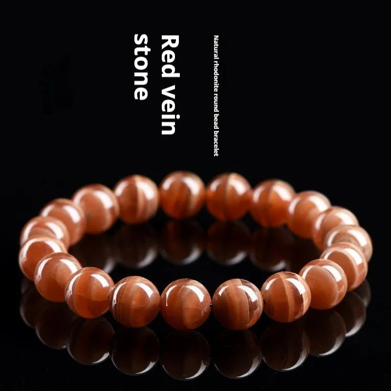 Natural rhodochrosite mineral bracelet with geometric beads in old mine colour