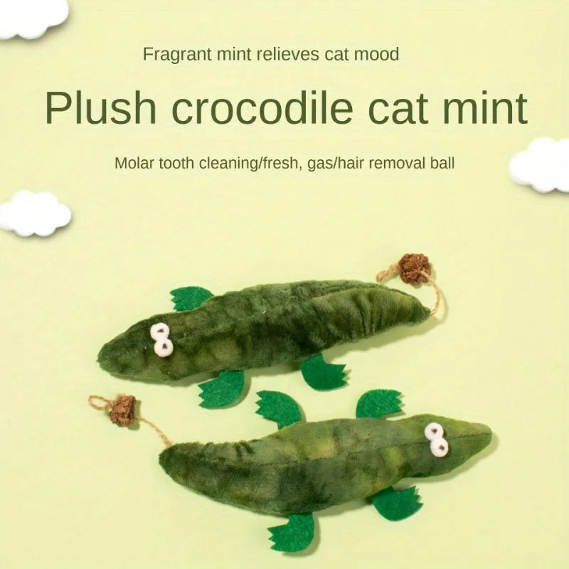 Green plush alligator cat toy with plant based catnip and peppermint scent for oral cleansing