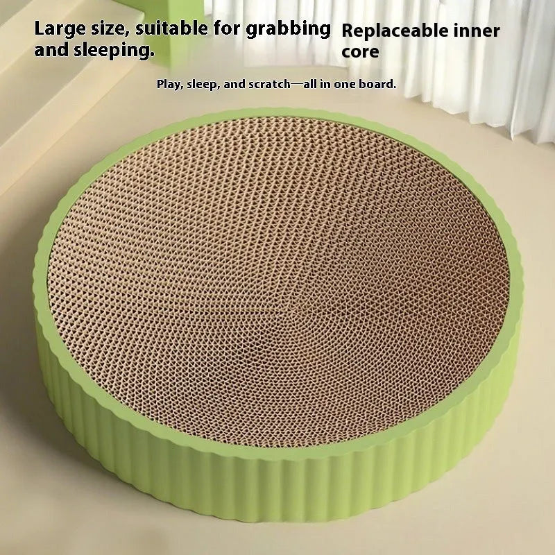 Round green cat scratching board with corrugated paper centre and two replacement packs.