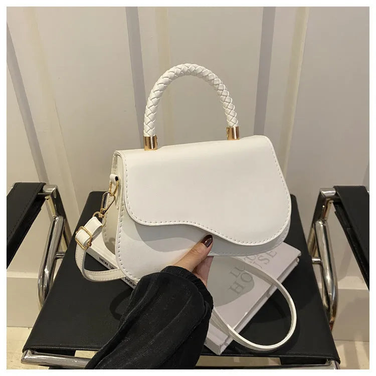 Soft PU one-shoulder bag with magnetic snap, horizontal square shape, shown in khaki with optional pendant.