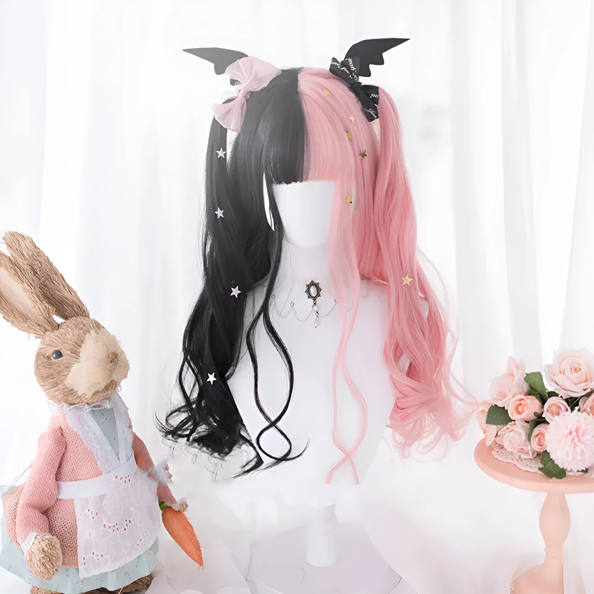 Black pink long curly Harajuku Lolita cosplay wig with bangs on display