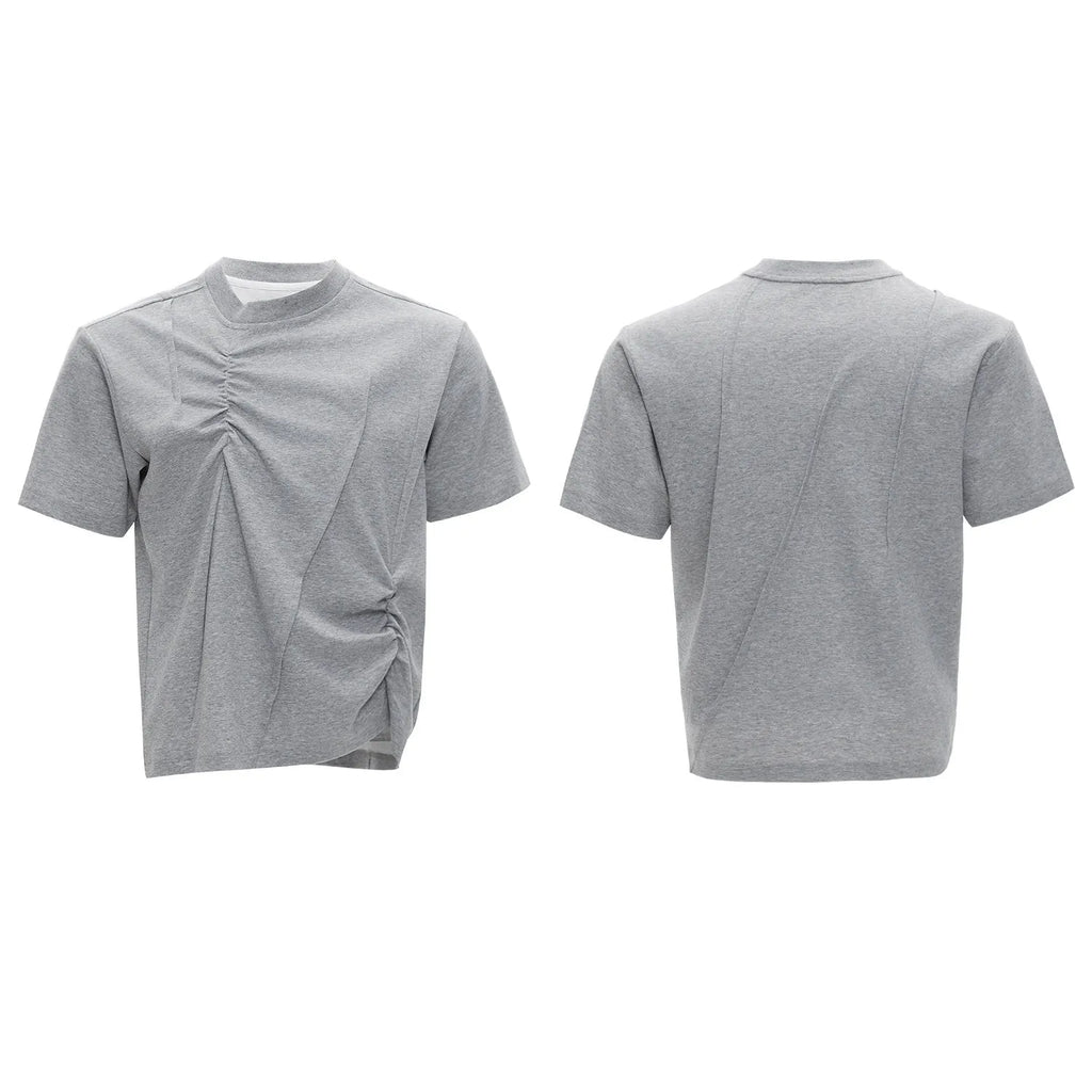 Men's black cotton t-shirt with three-dimensional pleats and a round neck, laid flat.