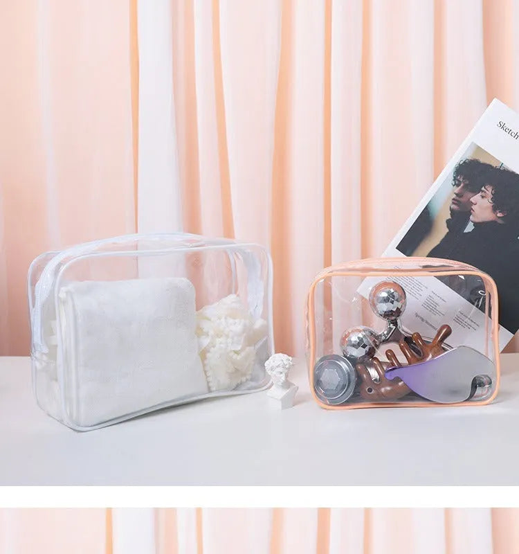 PVC transparent makeup bag set showing three semi-transparent bags in L and XL sizes