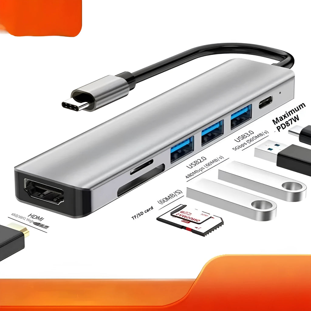 Silver aluminium USB-C 7-in-1 expansion dock with HDMI, VGA, USB 3.0 ports, and a 15cm cable