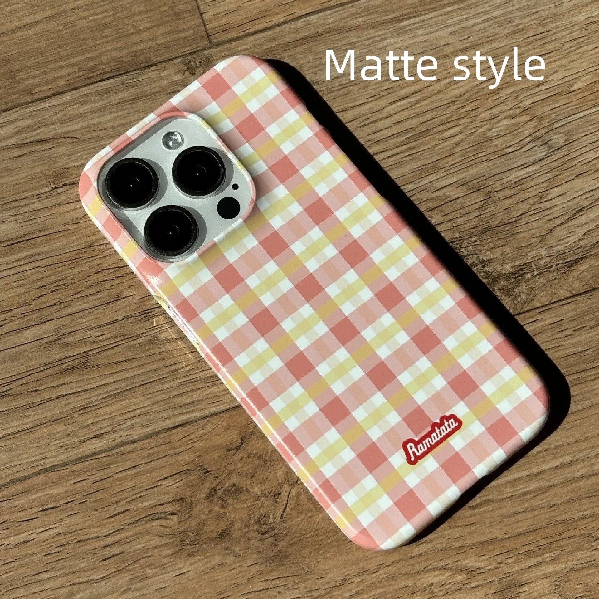 Original plaid design iPhone 15 Pro Max phone case in red and orange grid patterns with frosted and glossy finish options.