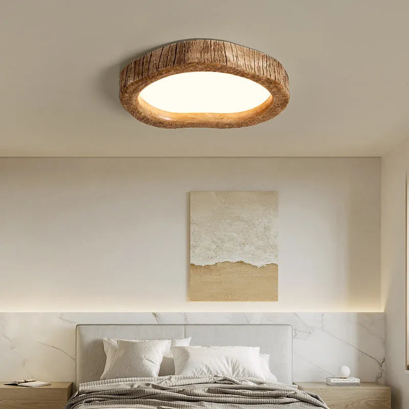 Wood grain finish round Chinese style LED ceiling lamp for bedroom illumination.