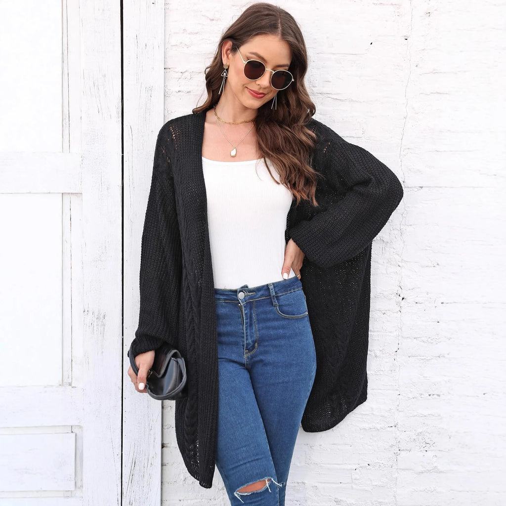 Women's loose-fit solid-colour acrylic sweater coat shown in light grey