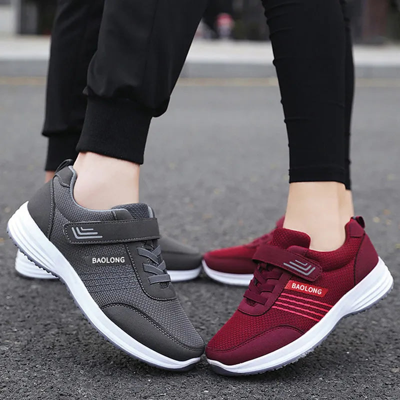 Breathable mesh walking shoes for elderly with non-slip soft sole in black, unisex lace-up design