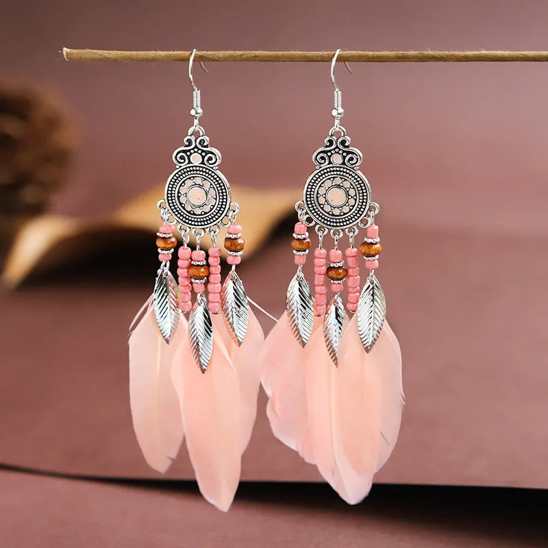 Feather-shaped alloy drop earrings with leaf patterns in electroplated colours for bohemian style