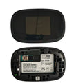 Black mifi8000 4G portable wireless router showing its compact size next to a data cable.