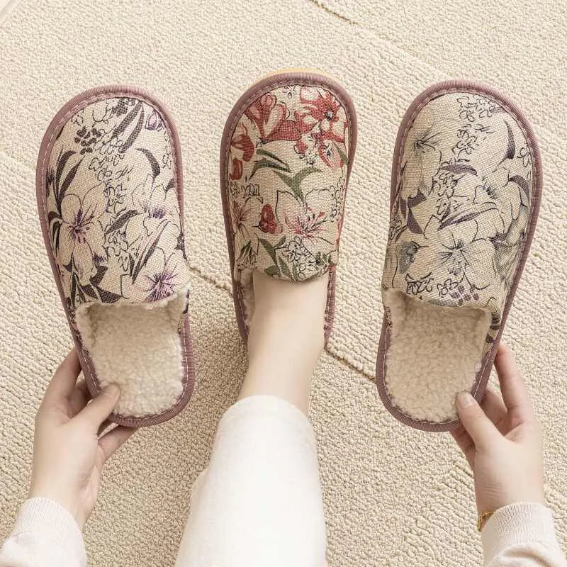 Household cotton slippers with winter linen surface and PVC sole in various floral colour patterns