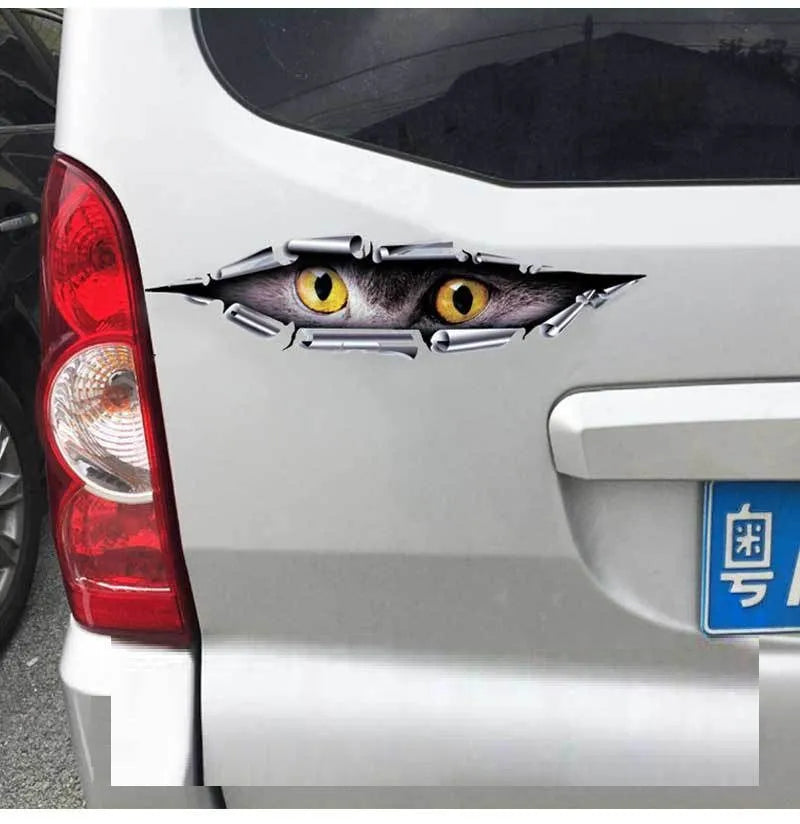 3D tiger eye and eagle eye car bumper sticker on vehicle door measuring 35cm by 10cm