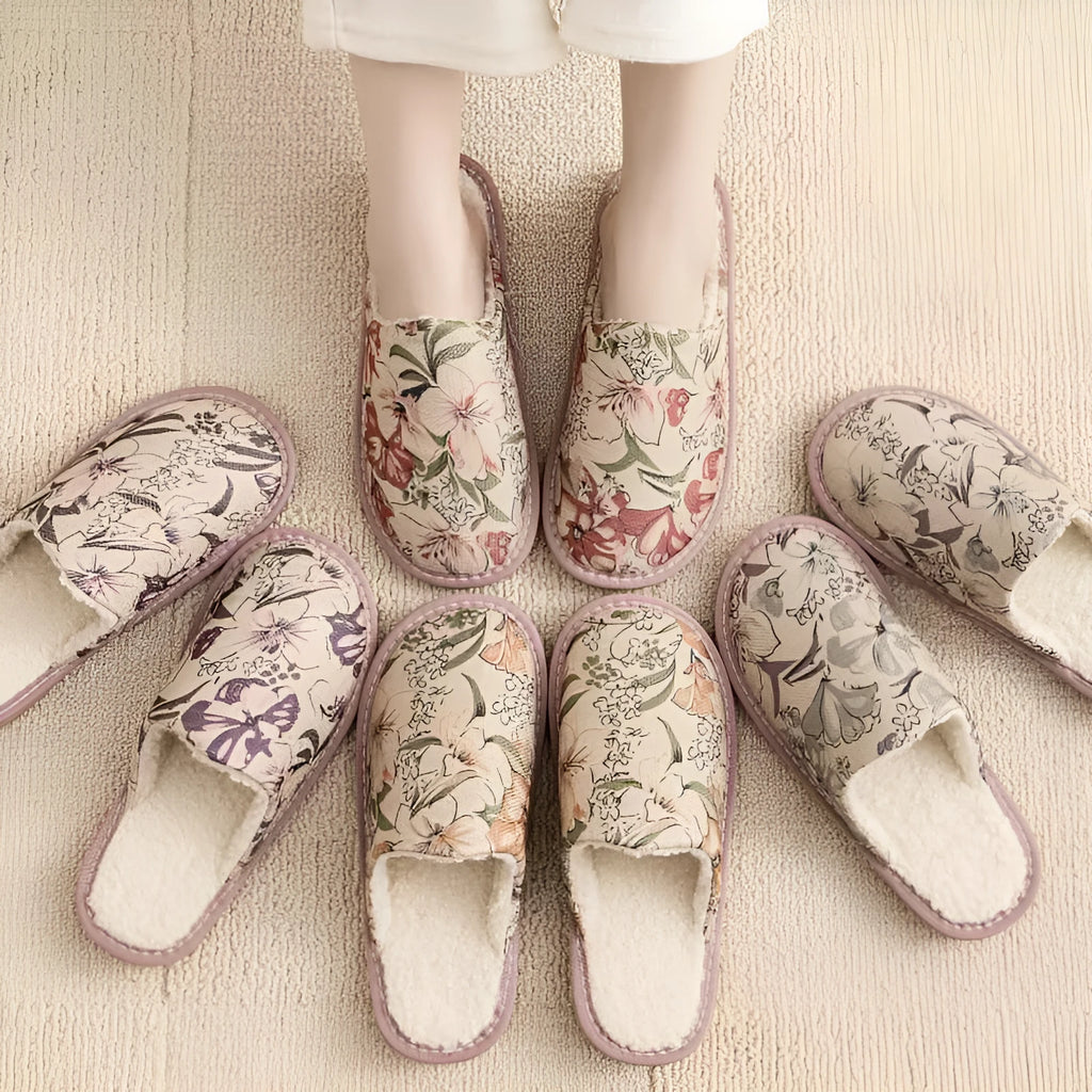 Household cotton slippers with winter linen surface and PVC sole in various floral colour patterns