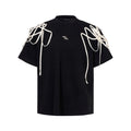 Black short-sleeved t-shirt with rivet ribbon padded shoulders and round neck collar